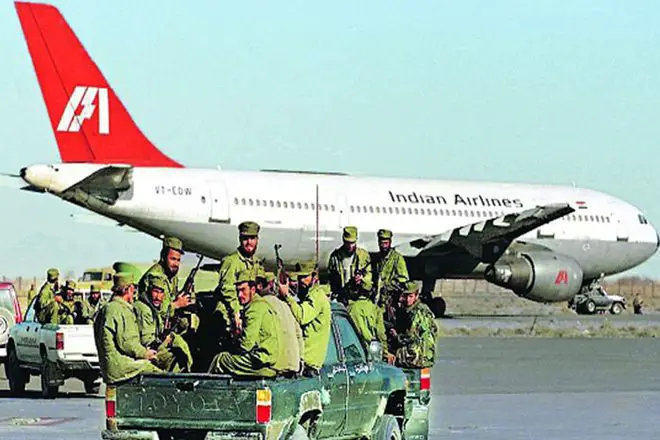Passengers undergoing security screening at an airport checkpoint, symbolizing efforts to mitigate terrorism risks in Nepal's aviation industry.