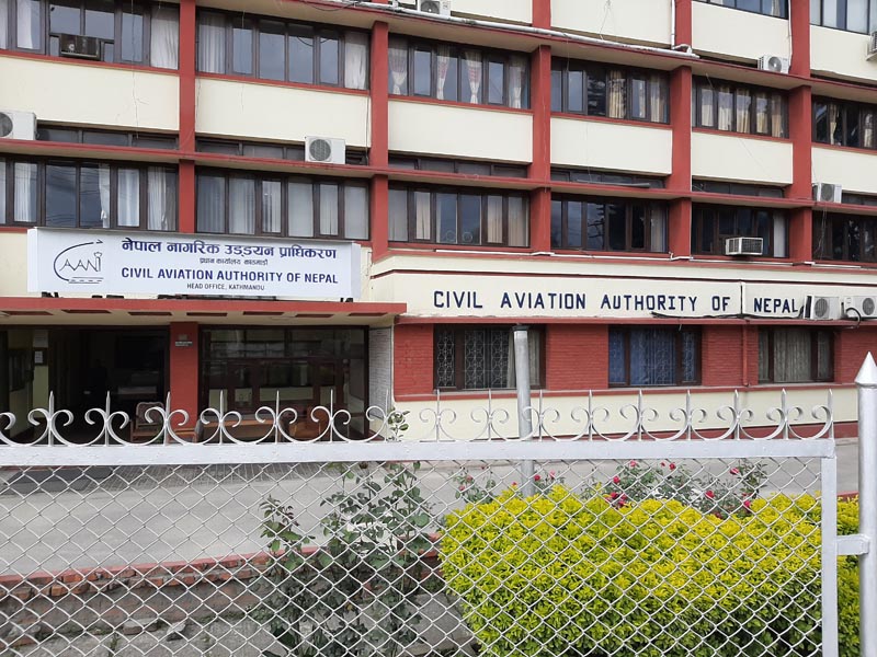 An airplane taking off against the backdrop of Nepal's mountains, representing the aviation industry's journey amidst government policies.