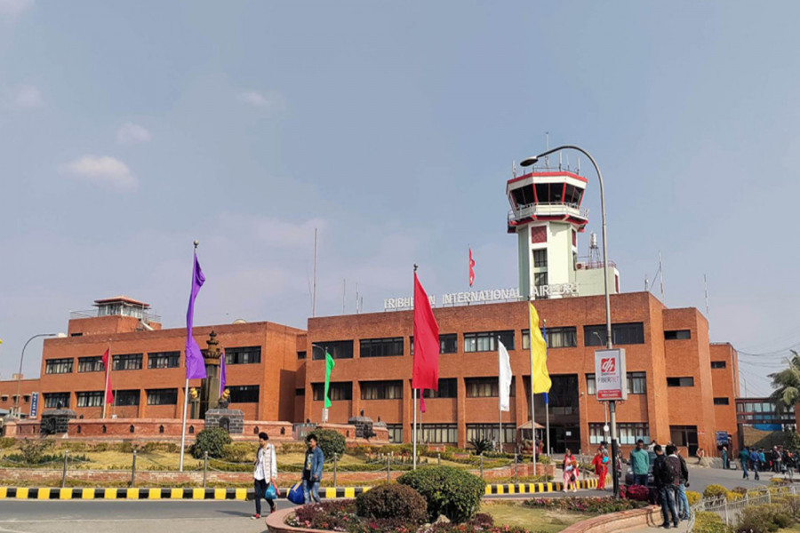 An airport terminal with aircraft and travelers, symbolizing the vital contribution of airports to tourism growth and economic development in Nepal.